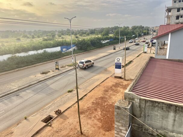 Roadside land for sale at Adenta